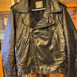 Vintage black leather motorcycle jacket